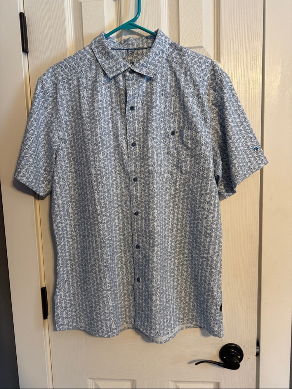 Men’s Kuhl brand short sleeved dress shirt size Large.